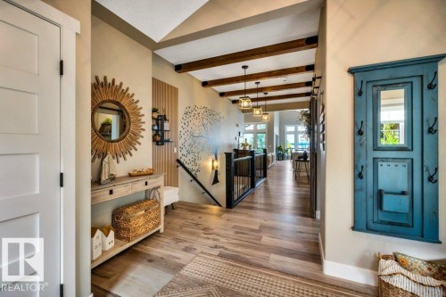 Spacious vaulted entrance sets the stage! - 180 Crystal Springs Drive, Rural Wetaskiwin County, AB - Indoor Photo Showing Other Room