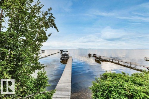 Waterfront property and direct water access - 180 Crystal Springs Drive, Rural Wetaskiwin County, AB - Outdoor With Body Of Water With View