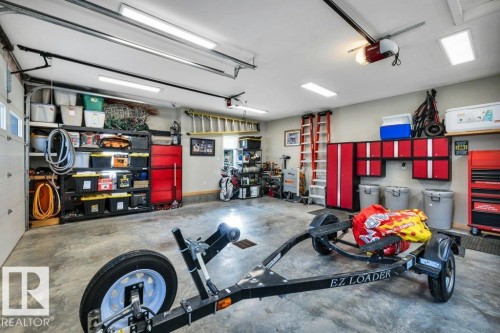 Oversized Double Heated Insulated Garage - 180 Crystal Springs Drive, Rural Wetaskiwin County, AB - Indoor Photo Showing Garage