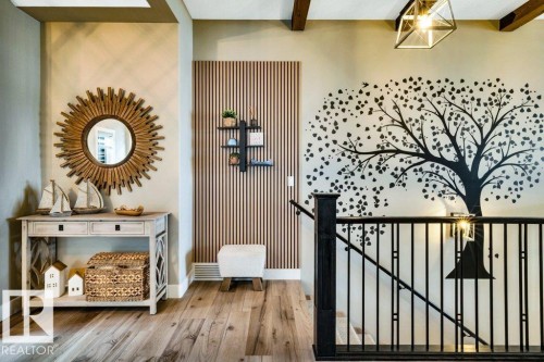 Showcases an Accent wall and exposed beams - 180 Crystal Springs Drive, Rural Wetaskiwin County, AB - Indoor Photo Showing Other Room