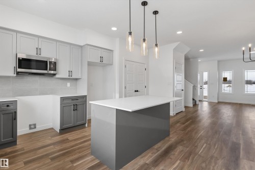 111 Sereno Lane, Fort Saskatchewan, AB - Indoor Photo Showing Kitchen With Upgraded Kitchen