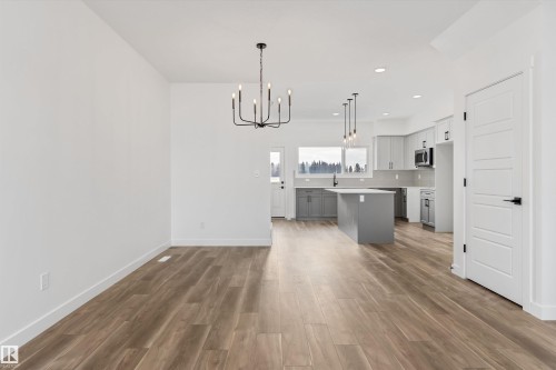 111 Sereno Lane, Fort Saskatchewan, AB - Indoor Photo Showing Kitchen With Upgraded Kitchen