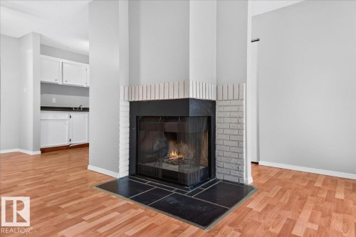 #35 2115 118 St Nw, Edmonton, AB - Indoor Photo Showing Living Room With Fireplace