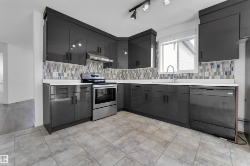 1545 49A Street Nw, Edmonton, AB - Indoor Photo Showing Kitchen With Upgraded Kitchen