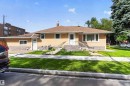 Stucco exterior with a shingle roof - 9402 117 Avenue Nw, Edmonton, AB  - Outdoor 