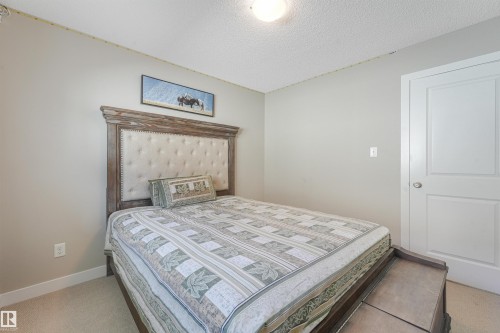 Light-colored walls, white trim, and a white interior door - 3359 13 Avenue Nw, Edmonton, AB 