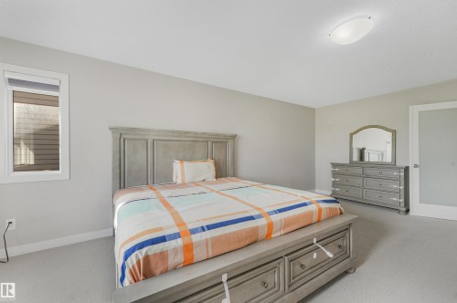 Recessed ceiling light, single window, and light gray wall finish - 3359 13 Avenue Nw, Edmonton, AB 