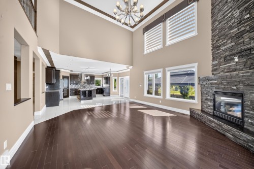 7103 168 Avenue Nw, Edmonton, AB - Indoor Photo Showing Other Room With Fireplace