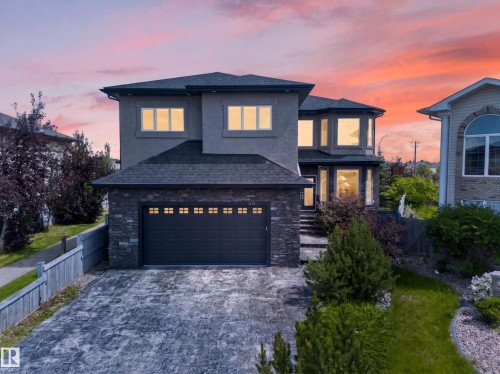 Two-story exterior with stucco and stone accents - 7103 168 Avenue Nw, Edmonton, AB - Outdoor