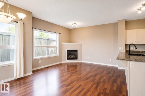 #59 3010 33 Av Nw, Edmonton, AB - Indoor With Fireplace