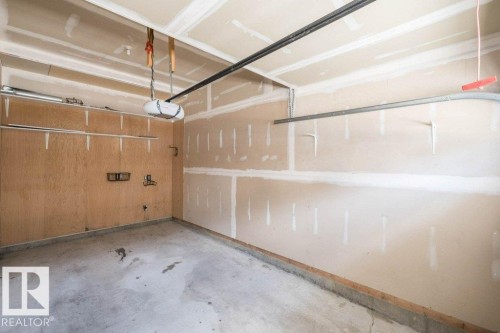 #59 3010 33 Av Nw, Edmonton, AB - Indoor Photo Showing Garage
