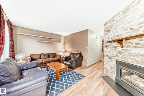 3151 139 Avenue Nw, Edmonton, AB - Indoor Photo Showing Living Room With Fireplace