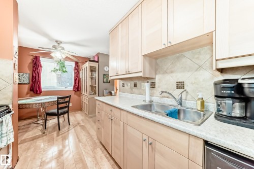 3151 139 Avenue Nw, Edmonton, AB - Indoor Photo Showing Kitchen With Double Sink