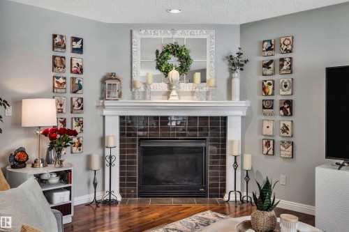 9804 145 Avenue Nw, Edmonton, AB - Indoor Photo Showing Living Room With Fireplace