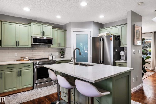 9804 145 Avenue Nw, Edmonton, AB - Indoor Photo Showing Kitchen With Double Sink With Upgraded Kitchen