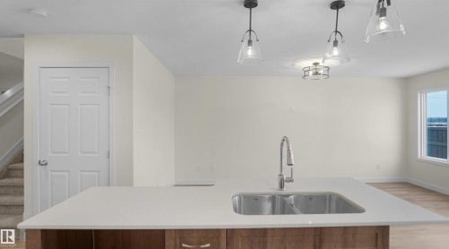 181 Munn Way, Leduc, AB - Indoor Photo Showing Kitchen With Double Sink