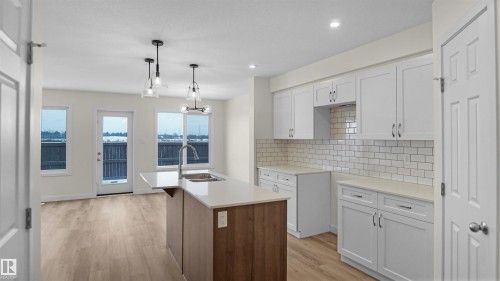 185 Munn Way, Leduc, AB - Indoor Photo Showing Kitchen With Double Sink With Upgraded Kitchen