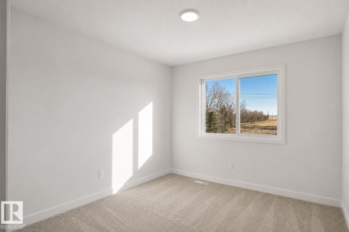 31 Emmett Way, Spruce Grove, AB - Indoor Photo Showing Other Room