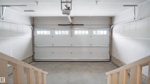 31 Emmett Way, Spruce Grove, AB - Indoor Photo Showing Garage