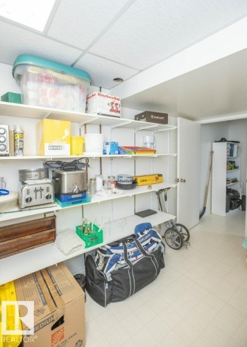 Adjustable wall-mounted shelving provides extensive storage capacity - 10729 108A Avenue, Westlock, AB - Indoor