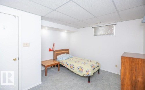 Recessed ceiling lighting, drop ceiling, and wall-to-wall carpeting - 10729 108A Avenue, Westlock, AB - Indoor
