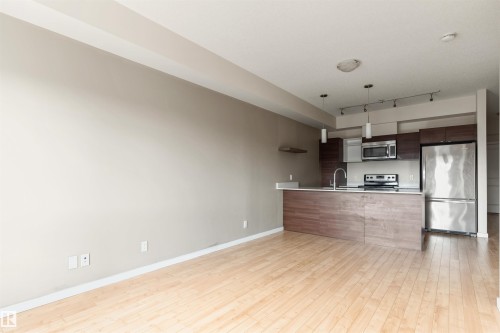 #401 9523 160 Av Nw, Edmonton, AB - Indoor Photo Showing Kitchen With Stainless Steel Kitchen