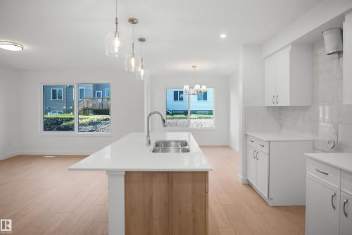 19 Emmett Way, Spruce Grove, AB - Indoor Photo Showing Kitchen With Double Sink