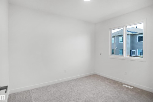 21 Emmett Way, Spruce Grove, AB - Indoor Photo Showing Other Room