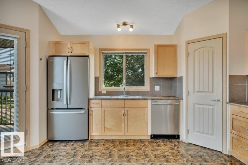 #90 604 62 St Sw, Edmonton, AB - Indoor Photo Showing Kitchen With Double Sink