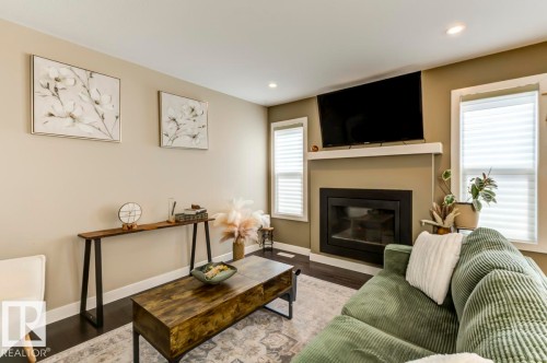 2339 Ware Crescent Nw, Edmonton, AB - Indoor Photo Showing Living Room With Fireplace