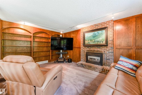 190 Gariepy Crescent Nw, Edmonton, AB - Indoor Photo Showing Living Room With Fireplace