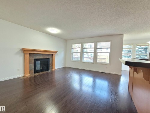 2562 Hanna Crescent Nw, Edmonton, AB - Indoor Photo Showing Living Room With Fireplace