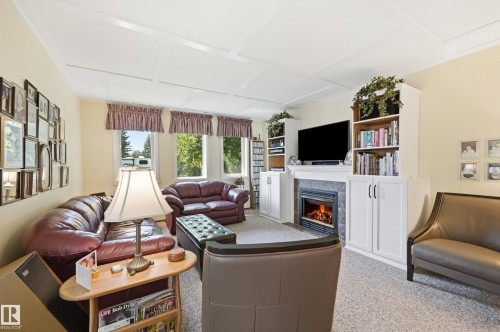 365 Kline Crescent Nw, Edmonton, AB - Indoor Photo Showing Living Room With Fireplace