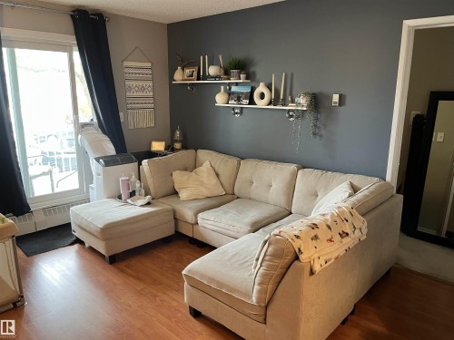 #205 5065 31 Av Nw, Edmonton, AB - Indoor Photo Showing Living Room