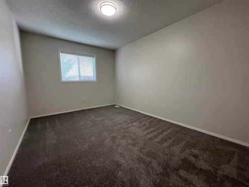 #A 17 Imperial Cr, Devon, AB - Indoor Photo Showing Other Room