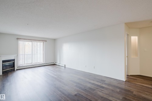 #324 2903 Rabbit Hill Rd Nw, Edmonton, AB - Indoor With Fireplace
