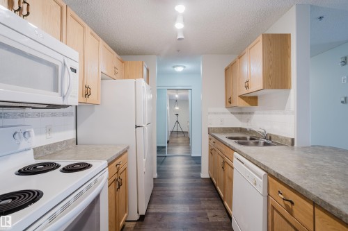 #324 2903 Rabbit Hill Rd Nw, Edmonton, AB - Indoor Photo Showing Kitchen With Double Sink