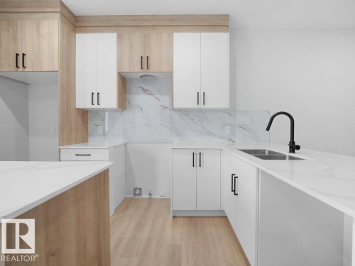 260 24 St Sw Sw, Edmonton, AB - Indoor Photo Showing Kitchen With Double Sink