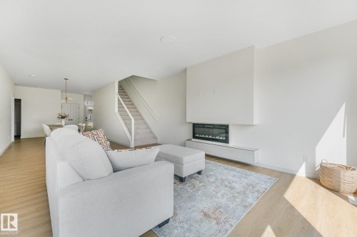 3217 Kulay Way Sw, Edmonton, AB - Indoor Photo Showing Living Room With Fireplace
