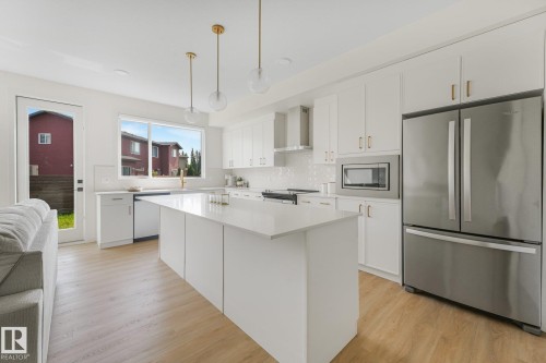 3217 Kulay Way Sw, Edmonton, AB - Indoor Photo Showing Kitchen With Upgraded Kitchen