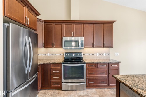 #214 50 Heatherglen Dr, Spruce Grove, AB - Indoor Photo Showing Kitchen With Stainless Steel Kitchen