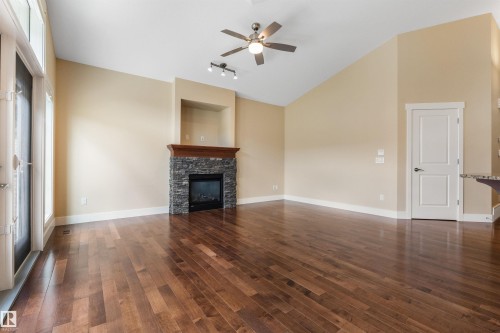 #214 50 Heatherglen Dr, Spruce Grove, AB - Indoor Photo Showing Living Room With Fireplace