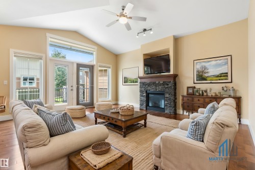 #214 50 Heatherglen Dr, Spruce Grove, AB - Indoor Photo Showing Living Room With Fireplace