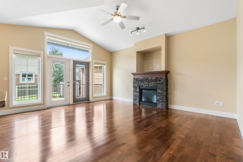 #214 50 Heatherglen Dr, Spruce Grove, AB - Indoor Photo Showing Living Room With Fireplace