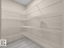 Corner storage system featuring multiple wire shelves - 