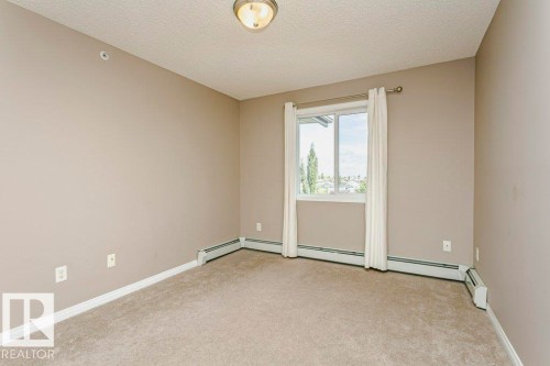 #411 3425 19 St Nw, Edmonton, AB - Indoor Photo Showing Other Room