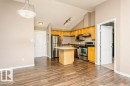 #411 3425 19 St Nw, Edmonton, AB  - Indoor Photo Showing Kitchen With Stainless Steel Kitchen 