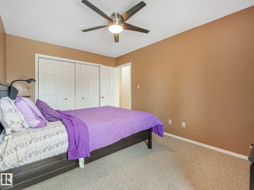 Ceiling fan with integrated lighting - 18417 66 Avenue Nw, Edmonton, AB - Indoor Photo Showing Bedroom