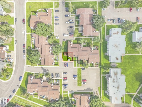 Aerial perspective showcasing property within a residential development, featuring a green lawn area - 18417 66 Avenue Nw, Edmonton, AB - Other
