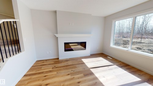 16 Nectar Wynd, St. Albert, AB - Indoor Photo Showing Living Room With Fireplace